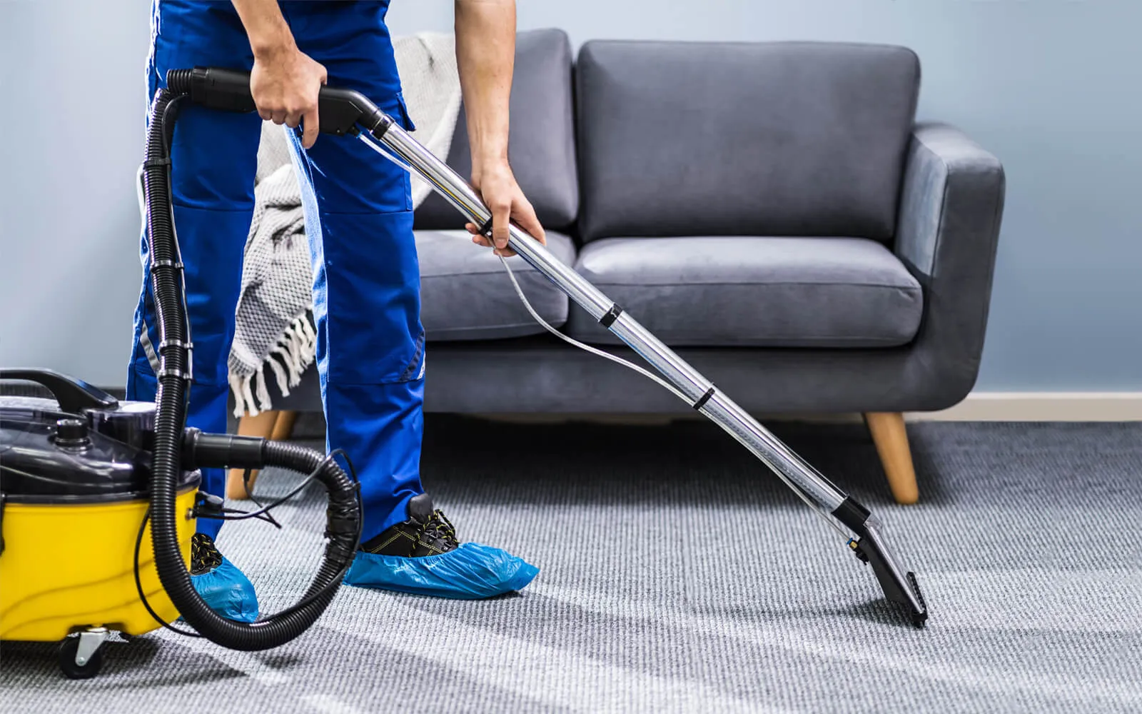 Man cleaning carpet
